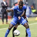 Hoffenheim's Togolese forward Ihlas Bebou, front, and Hertha's Slovakian defender Peter Pekarik vie for the ball during the Bundesliga soccer match between TSG 1899 Hoffenheim and Hertha BSC Berlin in Sinsheim, Germany, Saturday, May 16, 2020. The German Bundesliga becomes the world's first major soccer league to resume after a two-month suspension because of the coronavirus pandemic. (Thomas Kienzle/AFP pool via AP)