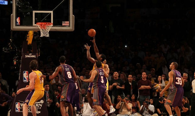 Ron Artest #37 of the Los Angeles Lakers shoots the game winning shot against the Phoenix Suns in t...