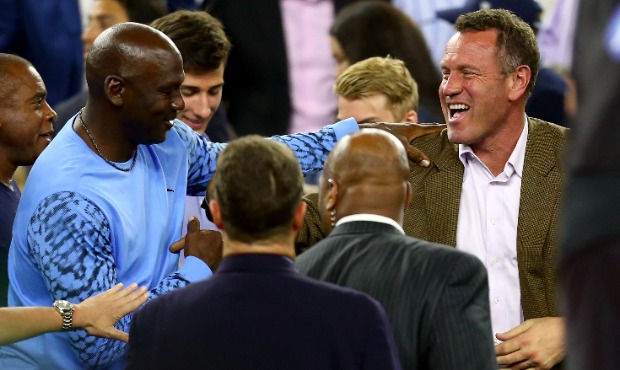 Michael Jordan talks with Dan Majerle are seen during the 2016 NCAA Men's Final Four National Champ...