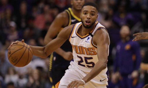 Phoenix Suns forward Mikal Bridges (25) drives during the second half of an NBA basketball game aga...