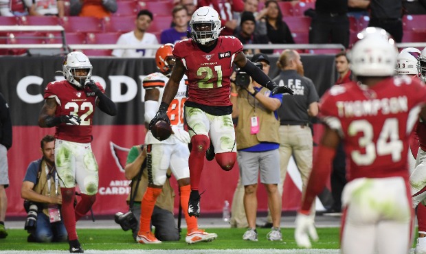 Patrick Peterson #21 of the Arizona Cardinals celebrates after intercepting a pass against the Clev...