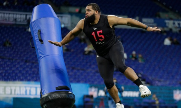 LSU defensive lineman Rashard Lawrence II runs a drill at the NFL football scouting combine in Indi...