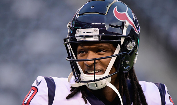 Wide receiver DeAndre Hopkins #10 of the Houston Texans smiles as he warms up before taking on the ...