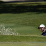 Daniel Berger hits out of a bunker on the first hole during the final round of the Charles Schwab Challenge golf tournament at the Colonial Country Club in Fort Worth, Texas, Sunday, June 14, 2020. (AP Photo/David J. Phillip)