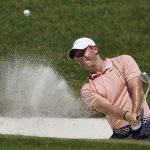 Rory McIlroy, of Northern Ireland, chips into the hole for a birdie on the 16th green during the final round of the Charles Schwab Challenge golf tournament at the Colonial Country Club in Fort Worth, Texas, Sunday, June 14, 2020. (AP Photo/David J. Phillip)