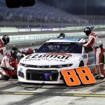 Alex Bowman (88) makes a pit stop during a NASCAR Cup Series auto race Sunday, June 14, 2020, in Homestead, Fla. (AP Photo/Wilfredo Lee)