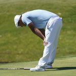 Bryson DeChambeau reacts after missing a birdie putt on the 18th green during the final round of the Charles Schwab Challenge golf tournament at the Colonial Country Club in Fort Worth, Texas, Sunday, June 14, 2020. (AP Photo/David J. Phillip)