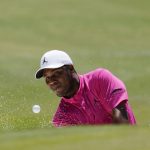 Harold Varner III hits out of a bunker on the 11th hole during the final round of the Charles Schwab Challenge golf tournament at the Colonial Country Club in Fort Worth, Texas, Sunday, June 14, 2020. (AP Photo/David J. Phillip)