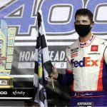 Denny Hamlin celebrates after winning a NASCAR Cup Series auto race Sunday, June 14, 2020, in Homestead, Fla. (AP Photo/Wilfredo Lee)