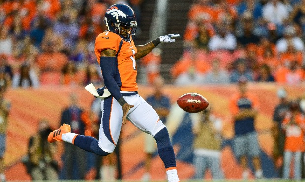 Punter Marquette King #1 of the Denver Broncos punts in the second quarter against the Minnesota Vi...