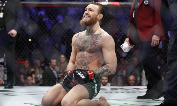 In this Saturday, Jan. 18, 2020, file photo, Conor McGregor smiles after defeating Donald "Cowboy" ...