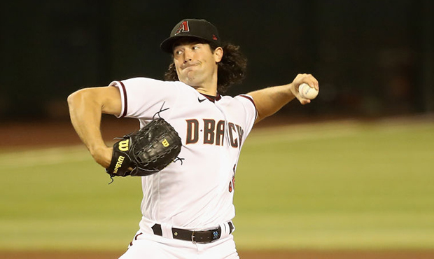 Starting pitcher Robbie Ray #38 of the Arizona Diamondbacks throws a pitch against the Los Angeles ...