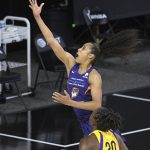 Phoenix Mercury guard Skylar Diggins-Smith goes up for a shot in front of Los Angeles Sparks forward Nneka Ogwumike (30) during the first half of a WNBA basketball game, Saturday, July 25, 2020, in Ellenton, Fla. (AP Photo/Phelan M. Ebenhack)