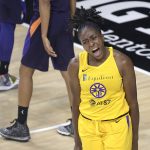 Los Angeles Sparks forward Nneka Ogwumike (30) celebrates after making a basket and getting fouled by Phoenix Mercury forward Brianna Turner (21) during the first half of a WNBA basketball game, Saturday, July 25, 2020, in Ellenton, Fla. (AP Photo/Phelan M. Ebenhack)