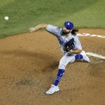 Los Angeles Dodgers starting pitcher Tony Gonsolin throws a pitch against the Arizona Diamondbacks during the fourth inning of a baseball game Friday, July 31, 2020, in Phoenix. (AP Photo/Ross D. Franklin)