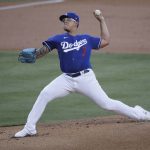 Los Angeles Dodgers starter Julio Urias throws to the Arizona Diamondbacks during the first inning of an exhibition baseball game Monday, July 20, 2020, in Los Angeles. (AP Photo/Marcio Jose Sanchez)