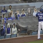 Los Angeles Dodgers' Cody Bellinger warms up during the first inning of an exhibition baseball game against the Arizona Diamondbacks Monday, July 20, 2020, in Los Angeles. (AP Photo/Marcio Jose Sanchez)