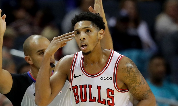 Cameron Payne #22 of the Chicago Bulls reacts after making a basket against the Charlotte Hornets d...