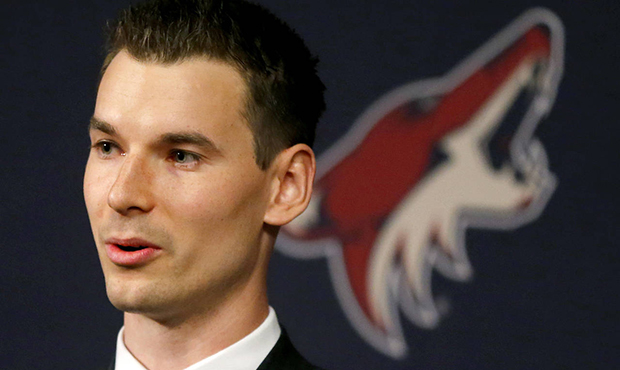 In this May 5, 2016, file photo, Arizona Coyotes general manager John Chayka speaks at a news confe...