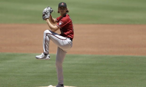 Arizona Diamondbacks starting pitcher Luke Weaver works agiainst a San Diego Padres batter during t...