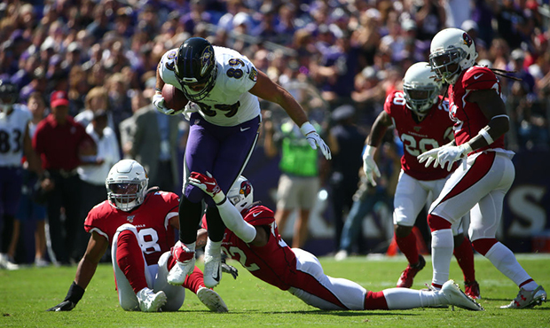 Mark Andrews #89 of the Baltimore Ravens runs after a catch against the Arizona Cardinals during th...