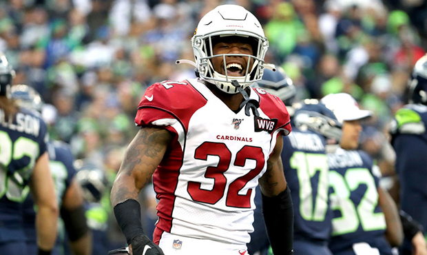 Strong safety Budda Baker #32 of the Arizona Cardinals celebrates after a defensive stop against th...