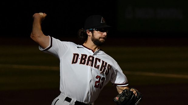 Zac Gallen #23 of the Arizona Diamondbacks delivers a third inning pitch against the Houston Astros...