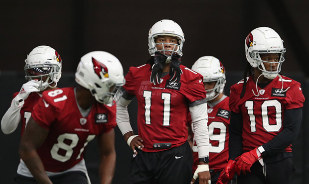 Wide receivers Larry Fitzgerald #11 and DeAndre Hopkins #10 of the Arizona Cardinals line up for dr...