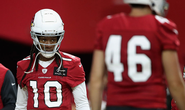 Wide receiver DeAndre Hopkins #10 of the Arizona Cardinals warms-up during a NFL team training camp...
