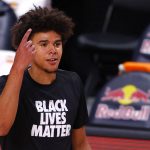 Phoenix Suns' Cameron Johnson warms up before an NBA basketball game against the Los Angeles Clippers, Tuesday, Aug. 4, 2020, in Lake Buena Vista, Fla. (Kevin C. Cox/Pool Photo via AP)