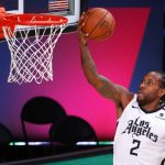 Los Angeles Clippers' Kawhi Leonard goes to the basket against the Phoenix Suns during an NBA basketball game Tuesday, Aug. 4, 2020, in Lake Buena Vista, Fla. (Kevin C. Cox/Pool Photo via AP)