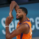 Phoenix Suns' Mikal Bridges  reacts after being charged with a foul during the first half of an NBA basketball game against the Indiana Pacers Thursday, Aug. 6, 2020, in Lake Buena Vista, Fla. (Kevin C. Cox/Pool Photo via AP)