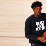 Los Angeles Clippers' Lou Williams warms up before an NBA basketball game against the Phoenix Suns, Tuesday, Aug. 4, 2020, in Lake Buena Vista, Fla. (Kevin C. Cox/Pool Photo via AP)