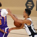 Los Angeles Clippers' Landry Shamet (20) and Phoenix Suns' Cameron Johnson (23) battle for control of the ball during the first half of an NBA basketball game Tuesday, Aug. 4, 2020, in Lake Buena Vista, Fla. (Kevin C. Cox/Pool Photo via AP)