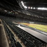 The seats remain empty as the Arizona Diamondbacks and the Houston Astros compete during the sixth inning of a baseball game Tuesday, Aug. 4, 2020, in Phoenix. (AP Photo/Matt York)