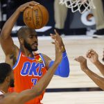 Oklahoma City Thunder's Chris Paul (3) is defended by Phoenix Suns players during the second quarter of an NBA basketball game Monday, Aug. 10, 2020, in Lake Buena Vista, Fla. (Mike Ehrmann/Pool Photo via AP)