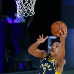 Indiana Pacers' Malcolm Brogdon ( 7) attacks the basket during the first half of an NBA basketball game against the Phoenix Suns Thursday, Aug. 6, 2020, in Lake Buena Vista, Fla. (Kevin C. Cox/Pool Photo via AP)