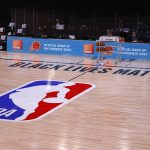 Black Lives Matter is seen on the court prior to the start of the NBA basketball game between Indiana Pacers and Phoenix Suns Thursday, Aug. 6, 2020, in Lake Buena Vista, Fla. (Kevin C. Cox/Pool Photo via AP)