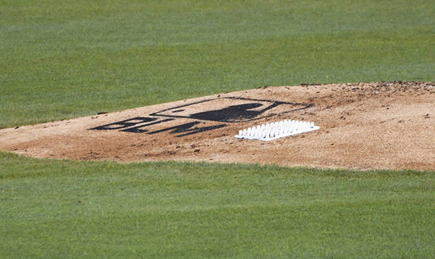 A Black Lives Matter logo adorns the pitcher's mound during the fourth inning of an opening day bas...