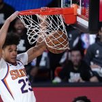 Phoenix Suns forward Cameron Johnson (23) slams home a dunk during the second half of an NBA basketball game Tuesday, Aug. 11, 2020, in Lake Buena Vista, Fla. (AP Photo/Ashley Landis, Pool)
