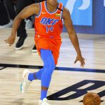 Oklahoma City Thunder's Devon Hall drives against the Phoenix Suns during the first quarter of an NBA basketball game Monday, Aug. 10, 2020, in Lake Buena Vista, Fla. (Mike Ehrmann/Pool Photo via AP)