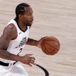 Los Angeles Clippers' Kawhi Leonard #2 dribbles down court during the first half of an NBA basketball game against the Phoenix Suns Tuesday, Aug. 4, 2020, in Lake Buena Vista, Fla. (Kevin C. Cox/Pool Photo via AP)
