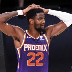 Phoenix Suns' Deandre Ayton  reacts after being charged with a foul during an NBA basketball game against the Los Angeles Clippers Tuesday, Aug. 4, 2020, in Lake Buena Vista, Fla. (Kevin C. Cox/Pool Photo via AP)