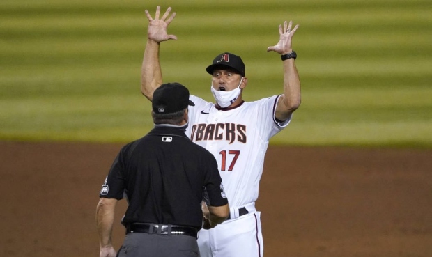 Arizona Diamondbacks manager Torey Lovullo reacts after being ejected from the game by umpire Rob D...