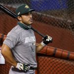 Oakland Athletics' Ramón Laureano waits to take batting practice prior to a baseball game against the Arizona Diamondbacks Monday, Aug. 17, 2020, in Phoenix. Laureano is serving a four game suspension for charging at the Houston Astros' bench and can return to play on Tuesday. (AP Photo/Matt York)
