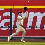
              San Diego Padres right fielder Wil Myersmakes the running catch on a ball hit by Arizona Diamondbacks' Kole Calhoun in the first inning during a baseball game, Friday, Aug 14, 2020, in Phoenix. (AP Photo/Rick Scuteri)
            