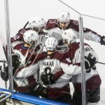 Colorado Avalanche celebrate a goal during first-period NHL Western Conference Stanley Cup playoff hockey game action against the Arizona Coyotes in Edmonton, Alberta, Monday, Aug. 17, 2020. (Jason Franson/The Canadian Press via AP)