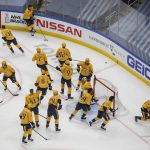 Nashville Predators warm up before taking on the Arizona Coyotes during NHL hockey Stanley Cup qualifying round game action in Edmonton, Alberta, Sunday, Aug. 2, 2020. (Jason Franson/The Canadian Press via AP)