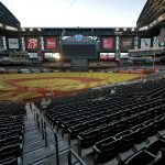 The Houston Astros and the Arizona Diamondbacks compete during the fourth inning of a baseball game Wednesday, Aug. 5, 2020, in Phoenix. (AP Photo/Matt York)