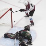 Colorado Avalanche's Matt Nieto (83) scores on Arizona Coyotes goalie Darcy Kuemper (35) during the first period in Game 4 of an NHL hockey first-round playoff series, Monday, Aug. 17, 2020, in Edmonton, Alberta. (Jason Franson/The Canadian Press via AP)